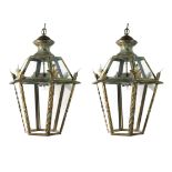 A pair of hexagonal gilt metal hall lanterns