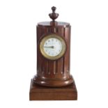 A Baltic mahogany mantel clock