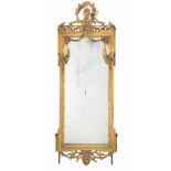 A North European gilt wood and gilt metal mirror