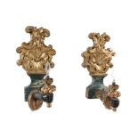 A pair of Italian giltwood and marbleised wall appliques