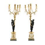 A pair of ormolu patinated bronze white marble