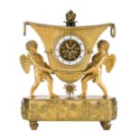 An Charles X ormolu and tôle peinte striking mantel Clock