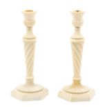 A pair of Anglo-Indian ivory candlesticks