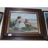 An Oil on Canvas of Two Young Girls on a Beach, signed J. Dinton, 39 x 29cm.