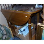 A Rectangular Walnut Coffee Table with Three Drawers & Stretcher, with an Oak Drop Leaf Table,