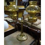 A Good 19th Century Brass Two Branch Oil Lamp with coloured base and glass shades.