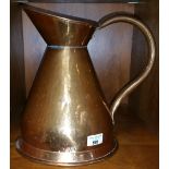 A Large Copper Measuring Jug, H-30cm.