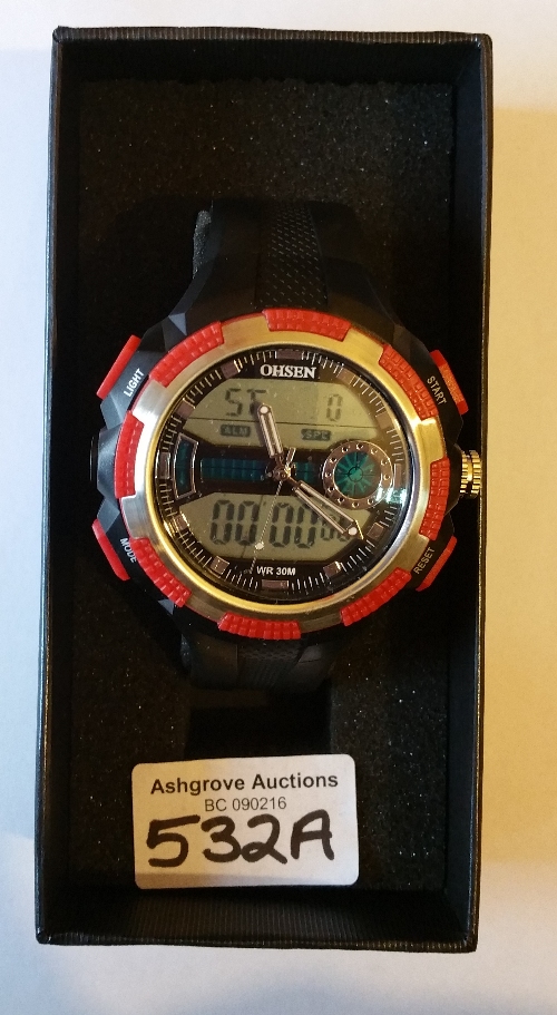 A Mens Ohsen LED Digital and Analog Rubber Band Wrist Watch.