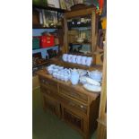 A Late Oak Victorian Bedroom Suite, veneered with rosewood and highly decorated with swags and bells