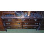A Mahogany Low Dresser; fitted with seven frieze drawers, flanked by columns.