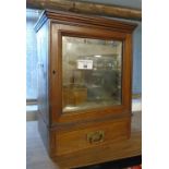 A 19th Century Oak Table Cabinet with bevelled glass front, drawer and fitted interior.