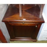 A Modern Mahogany Strong Reinforced Cabinet, a brushing slide above a panelled door, along with