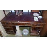 A Leather Topped Pedestal Writing Desk.