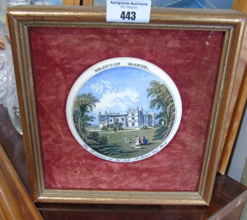 A Prattware Lid; framed on burgundy velvet background.