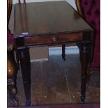 A Georgian Mahogany Drop Leaf Pembroke Table; with single frieze drawer on tapered ring supports.