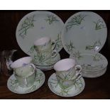 A 20 Piece Hand-Painted and Signed Snowdrop Tea Set, circa 1900.