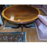 A Mahogany and Satinwood Crossbanded Round Table on Pod.