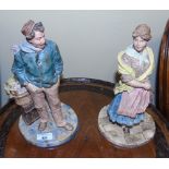 A Pair of 19th Century Terracotta Figures of a Fisherman & Wife.