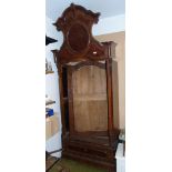 A Continental Walnut and Amboyna Armoire, (lacks door mirror and back boards), with a wardrobe