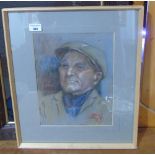 An Early 20th Century Pastel of an elderly gentleman wearing a cap, indistinctively signed.