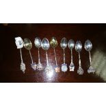 A Collection of Nine Hallmarked Silver Souvenir Spoons, pre-war dates.