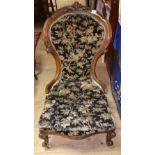 A Victorian Walnut Show Frame Lady's Nursing Chair.