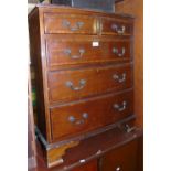 An Early 20th Century Mahogany Bow Fronted Chest; with five graduated drawers on bracket feet.