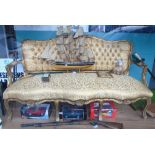 A Continental Gilt and Upholstered Settee, having a serpentine rail with shell cresting above a