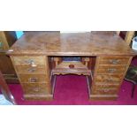 A Wonderful 19th Century Mahogany Kneehole Desk, with four drawers to each pedestal and recessed