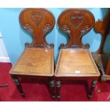 A Pair of Very Good William IV Mahogany Hall Chairs with shaped backs.