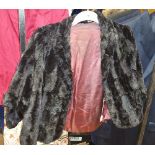 A Short Black Fur Coat.