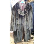 A Dark Brown Ladies Faux Fur Coat, size 12.