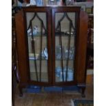 Early 20th Century Mahogany Veneered Bow Front Display Cabinet; with three glass shelves.