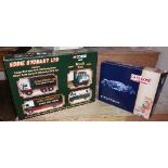 A Corgi Eddie Stobart Truck Set (with Cargo Box Van, Fork Lift Truck, Short Wheel Base Lorry &