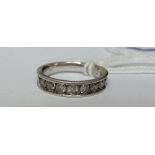 A 14ct Diamond Eternity Ring, approximately 1 carat in diamond weight.