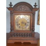 A Walnut Mantle Clock by Ganter of Dublin.