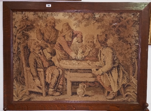 A 19th Century Tapestry 'The Card Players'; in an Oak frame.