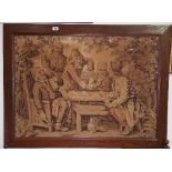 A 19th Century Tapestry 'The Card Players'; in an Oak frame.