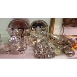 A Good Selection of Silver-Plate Items to include a three piece tea service, six eggcups on stand,