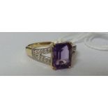 A Gold Diamond and Amethyst Ring.