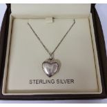 A Silver Locket on a Silver Chain.