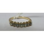 A 9ct Gem Set Eternity Ring.