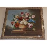 A Large Oil on Canvas Depicting a Still Life of Flowers, mounted in a decorative gilt frame, 75cm