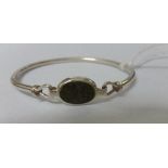 A Silver Stone Set Bangle.