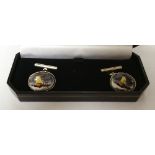 A Pair of Silver Enamel Duck Cufflinks.