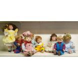 Eight 'Children' Porcelain Dolls.