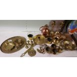 A Collection of Decorative Brass Items to include three cauldrons, a milk churn, candlesticks, etc.