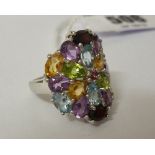 A Silver Multi Gem Ring.