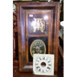 A Late 19th Century American Rosewood Cased Wall Clock, having a glass panel door.