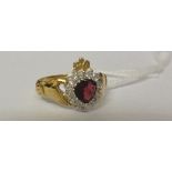 A 9ct Gold Gem Set Claddagh Ring.